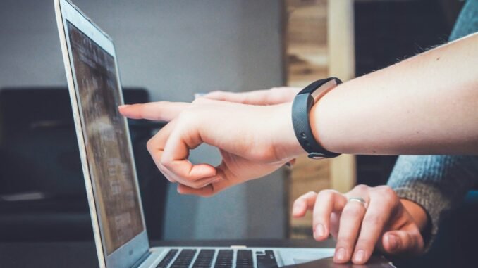 ChatGPT gains agentic capability for complex research People looking at a laptop screen illustrating the launch of an agentic AI capability in ChatGPT that enables the artificial intelligence tool to conduct complex research.